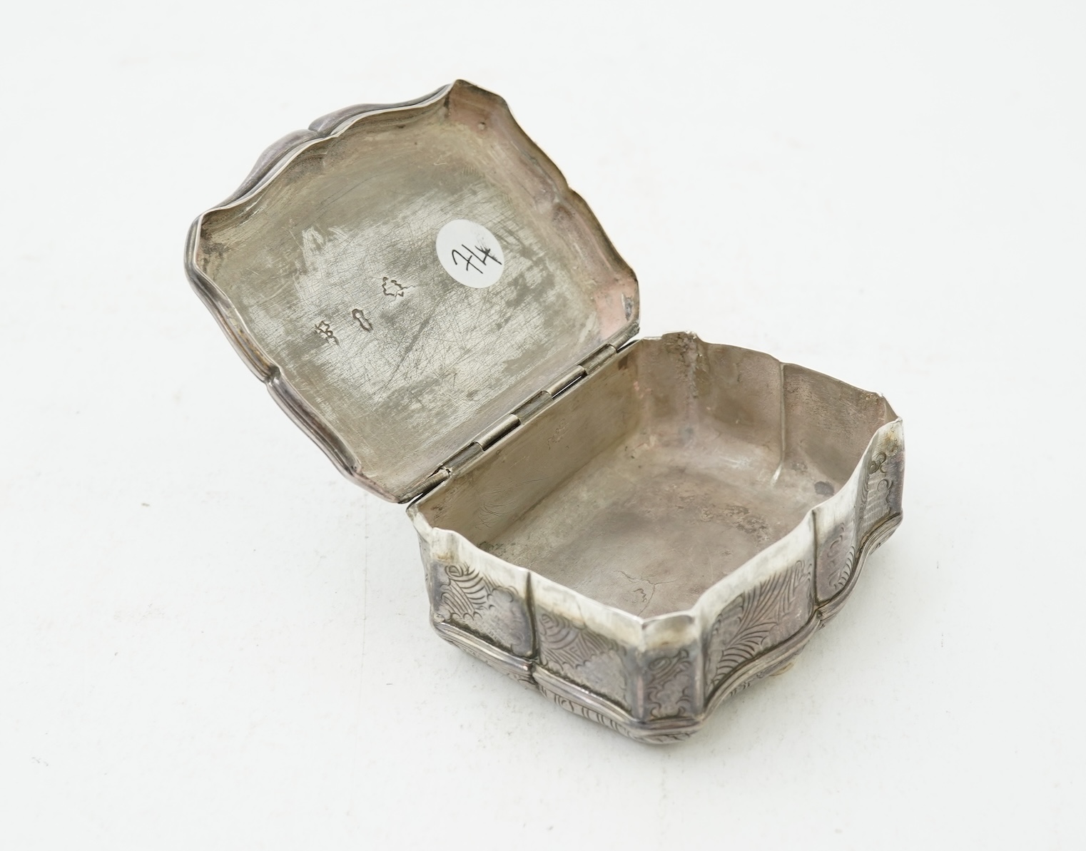 An early 19th century French white metal snuff box, with hinged cover